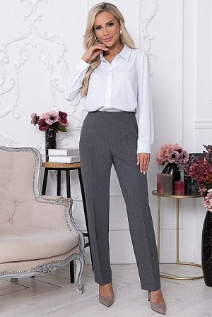 Брюки 5148 *	Брюки из костюмной ткани с заутюженными стрелками,зауженные к низу.Застежка в боковом шве на потайную молнию.Притачной пояс с застежкой на пуговицу,по спинке собранный на эластичную резин