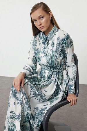 Зеленое платье с тканым рисунком