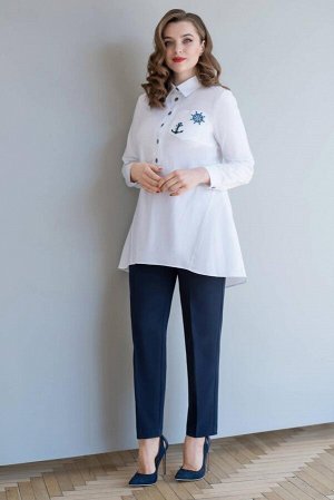 Блуза Рубашка женская расширенного силуэта для повседневной носки.
 Низ  асимметричный, перед короче спинки.
Длина  по спинке – 86 см, длина рукава с манжетой и- 59 см. Тип ткани: блузочная.
ПЭ-22%; Х