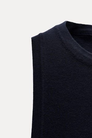 Топ Цвет как на первом фото ГЛАДКИЙ ТРИКОТАЖНЫЙ ТОП (GLATTES STRICKOBERTEIL) Топ без рукавов с круглым вырезом. СОСТАВ МАТЕРИАЛА, ИНСТРУКЦИИ ПО УХОДУ И ПРОИСХОЖДЕНИЕ СОСТАВ МАТЕРИАЛА СНАРУЖИ 72% хлопо
