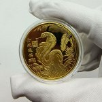 МОНЕТА С СИМВОЛОМ ПРЕДСТОЯЩЕГО ГОДА