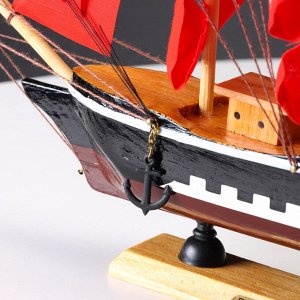 Сувенирная модель корабля «Флора», борта чёрные с белой полосой, паруса алые, 32x6.5x31 см