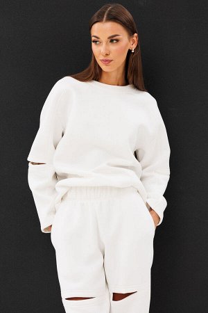 Костюм Костюм Kivviwear 4223422401 экрю 
Состав: ПЭ-26%; Хлопок-70%; Эластан-4%;
Сезон: Осень-Зима

Представляем вам уникальный спортивный костюм, который сочетает в себе стиль и комфорт. Брюки свобо