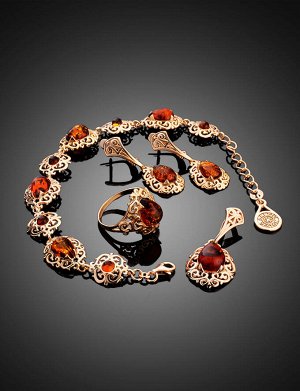 Ажурный позолоченный браслет с натуральным янтарём коньячного цвета «Луксор», 812604142