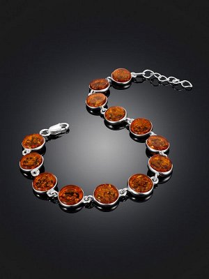 Стильный браслет «Фурор», украшенный янтарём коньячного цвета