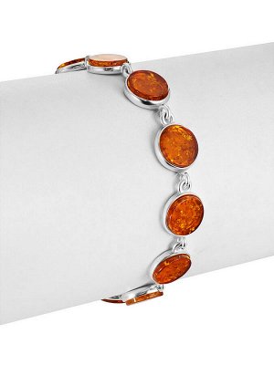 Стильный браслет «Фурор», украшенный янтарём коньячного цвета