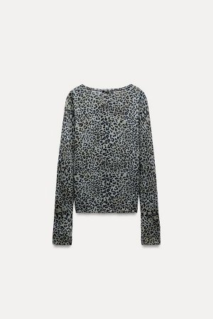 Топ Цвет как на первом фото ТРИКОТАЖНЫЙ ТОП С ЖИВОТНЫМ ПРИНТОМ (STRICKOBERTEIL MIT ANIMALPRINT) Топ тонкой вязки с круглым вырезом и длинными рукавами. СОСТАВ МАТЕРИАЛА, ИНСТРУКЦИИ ПО УХОДУ И ПРОИСХОЖ