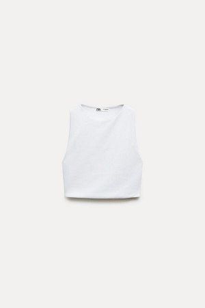 Топ Цвет как на первом фото УКОРОЧЕННЫЙ ТОП ПОЛИАМИД (CROP-TOP AUS POLYAMID) СРЕДНЯЯ ВЕСА – ПРИГЛАЖЕННЫЙ ПОРОГ – КРУГЛЫЙ ШЕИ – КОРОТКИЙ – БЕЗ РУКАВОВ Приталенный укороченный топ без рукавов с эластичн