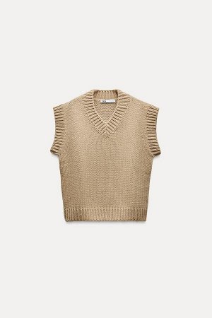 Топ Цвет как на первом фото ТРИКОТАЖНЫЙ ЖИЛЕТ С ШАРФОМ (STRICKWESTE MIT SCHAL) Вязаный жилет с V-образным вырезом, шарфом и рукавами без рукавов. С ребристыми манжетами. СОСТАВ МАТЕРИАЛА, ИНСТРУКЦИИ П