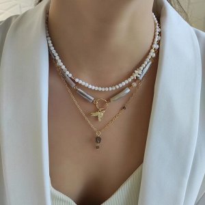 Сет из столбиков перламутра, из раухтопаза и коралла в позолоченой фурнитуре