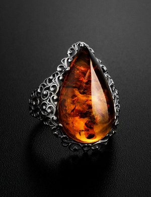 Роскошное серебряное кольцо с янтарём коньячного цвета «Луксор»