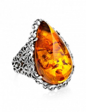 Роскошное серебряное кольцо с янтарём коньячного цвета «Луксор»