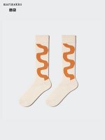 UNIQLO - высокие носки с принтом змейки от Marimekko