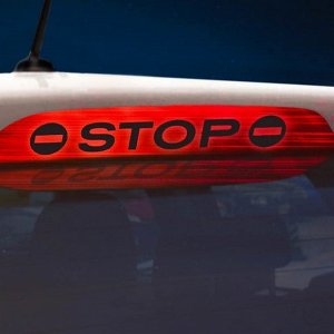 Наклейка на стоп сигнал на заднее стекло "STOP"