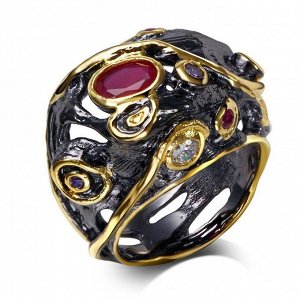 Кольцо 'Черное золото' со вставками из малиновых цирконов