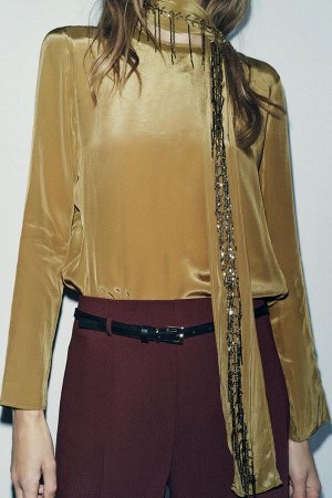 Топ Цвет как на первом фото ТОП С ШАРФОМ С ВЫШИВКОЙ ZW COLLECTION (TOP MIT GESTICKTEM HALSTUCH ZW COLLECTION) ZARA ЖЕНСКАЯ КОЛЛЕКЦИЯ Топ с круглым вырезом и длинными рукавами. Деталь шарфа с вышивкой 