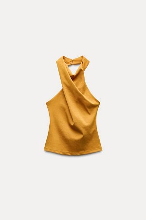 Топ Цвет как на первом фото ЭЛАСТИЧНЫЙ ТОП С ДРАПИРОВКОЙ (ELASTISCHES TOP MIT DRAPIERUNG) Струящийся топ с воротником-халтер из эластичной ткани с пуговицами. Без спинки. СОСТАВ МАТЕРИАЛА, ИНСТРУКЦИИ 