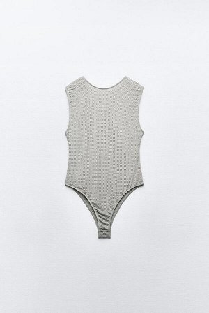 Топ Цвет как на первом фото БОДИ С БЛЕСКАМИ ИЗ ТЮЛЯ (GLITZERBODY MIT T?LL) Боди без рукавов с круглым вырезом. Вырез на спине. Соответствующие блестящие детали. Застежка на кнопку в промежности. СОСТА