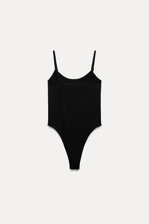 Топ Цвет как на первом фото КОРПУС - БЕСШОВНЫЙ (BODY – SEAMLESS) Облегающее фигуру боди с круглым вырезом и узкими регулируемыми бретелями. Застежка на кнопку в промежности. СОСТАВ МАТЕРИАЛА, ИНСТРУКЦ