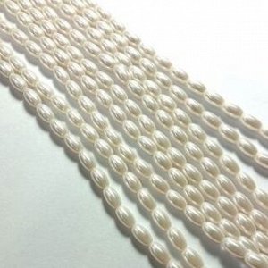 Бусины Майорка белый Рис 4х6 мм