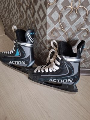 Коньки хоккейные action