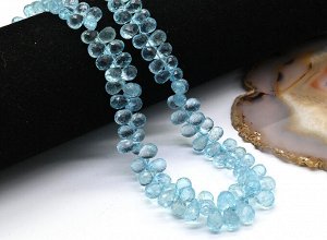 Бусины из голубого топаза капля на увеличение гр.7*5-12*6мм, 45см, 163 бусины, 63,80г