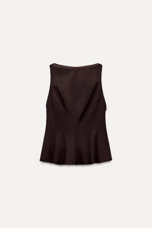 Топ Цвет как на первом фото ТОП С БАСКОЙ (PEPLUM-OBERTEIL) Облегающий фигуру топ с круглым вырезом и рукавами без рукавов. Подол баски. Внутренняя подкладка. Потайная молния в боковом шве. СОСТАВ МАТЕ