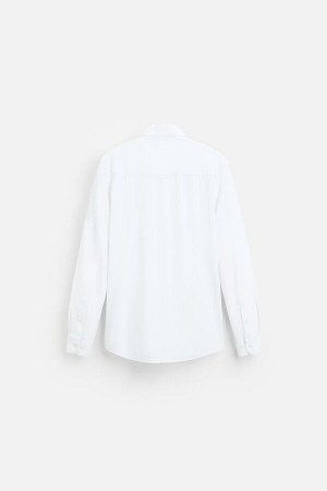 Рубашка ЦВЕТ как на первом фото РУБАШКА ИЗ СТРЕЙЧ-ТЕКСТУРЫ (ELASTISCHES HEMD MIT TEXTUR) Приталенная рубашка из ткани, практически не требующей глажки. Открытый воротник-виндзор. Длинные рукава с заст