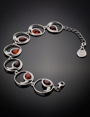 Яркий оригинальный браслет из цельного коньячного янтаря «Лирика»