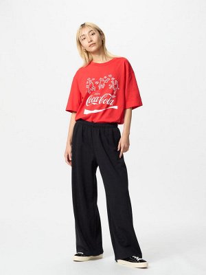 UNIQLO - футболка коллаборации Сoca-cola&Keith Haring