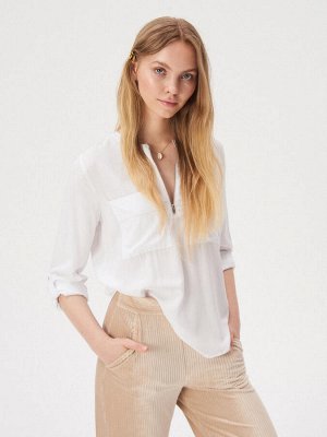 Блузка с карманами