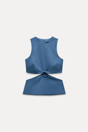 Топ Цвет как на первом фото СТРЕЙЧ ТОП С ВЫРЕЗОМ (STRETCH-OBERTEIL MIT CUT-OUT) Приталенный топ без рукавов с круглым вырезом. Вырезы и кольцо спереди. Контрастная внутренняя подкладка того же цвета. 