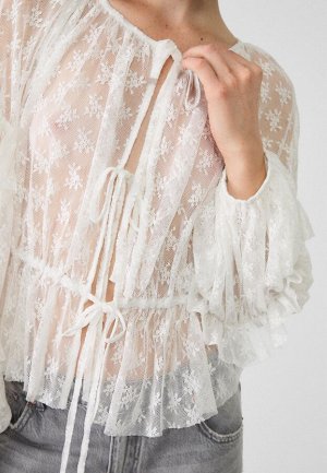 Рубашка Кружевная рубашка с воланами (Lace-Hemd mit Volants) Полупрозрачная рубашка с круглым вырезом и длинными рукавами с эластичными манжетами. Воланы. Застежка спереди с бантиками. Без внутренней 