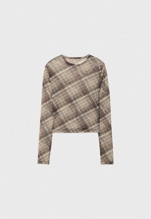 Рубашка Рубашка из тюля с клетчатым узором (Shirt aus T?ll mit Karomuster) Полупрозрачная рубашка из тюля. Круглый вырез горловины и длинные рукава. Без внутренней подкладки.