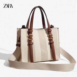 Сумка Сумка бренда &quot; ZARA &quot;- это всегда отменный стиль и высокое качество.Комплектуется 2-мя длинными ремнями: узким кожаным и широким тканевым.
Материал : экокожа + спец.сумочный водонепрон