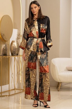 Klimt 4426 Комплект Mia-Amore состоит из жакета свободного силуэта с длинным рукавом и широких брюк- палаццо. Изделия комплекта выполнены из сочетаний принтованного смесового шелка. Линию талии можно 