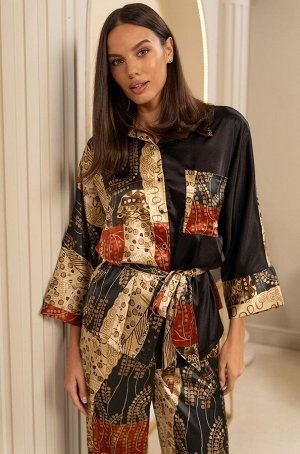 Klimt 4426 Комплект Mia-Amore состоит из жакета свободного силуэта с длинным рукавом и широких брюк- палаццо. Изделия комплекта выполнены из сочетаний принтованного смесового шелка. Линию талии можно 