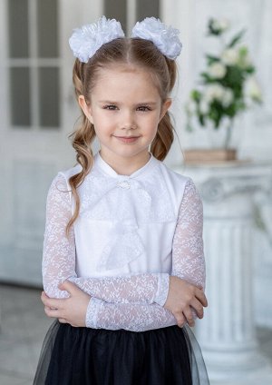 Фрита Трикотажная блузка для девочек младшего и среднего школьного возраста, идеальный вариант на каждый день и не только. При этом, казалось бы простой дизайн и украшение в виде банта позволяют сочет