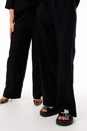 Костюм Костюм Kivviwear 4285428403 черный 
Состав: Вискоза-100%;
Сезон: Весна
Рост: 170

Стильный костюм из джемпера и брюк свободного кроя идеальный выбор для повседневного образа!Уникальный комплек
