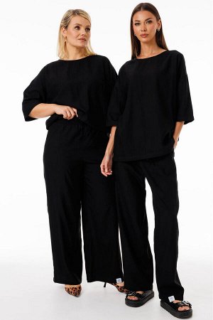 Костюм Костюм Kivviwear 4285428403 черный 
Состав: Вискоза-100%;
Сезон: Весна
Рост: 170

Стильный костюм из джемпера и брюк свободного кроя идеальный выбор для повседневного образа!Уникальный комплек