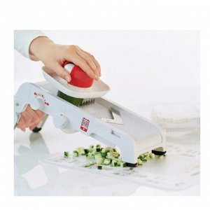 Овощерезка Мандолина™ с 2 встроенными насадками - Tupperware®.