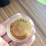 Монета
