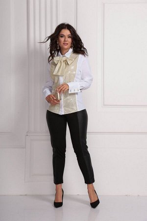 Блузка полиэстер-100% Рост: 170 см. Нарядная женская блузка свободного силуэта из двух видов ткани: блузочной и и отделочного трикотажа-люрекса.По переду и по спинке рельефы от плеча. По среднему шву 