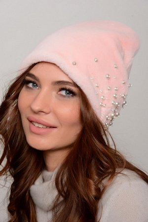 Шапка Удлинённая молодёжная шапка из искусственного меха (имитация – кролик), нежно – розового оттенка.

Удлинённая молодёжная шапка формы «колпак». Височная часть расшита жемчужными бусинами разной в