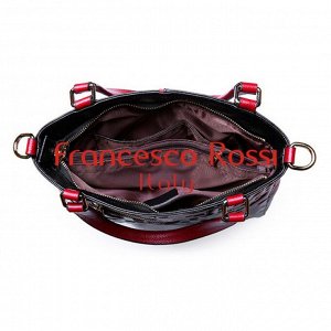 Placide Удобная женская сумка из натуральной кожи черного цвета с красными вставками. Размеры: длина - 29 см, ширина - 15 см, высота - 24 см. Сумку можно носить за короткие ручки или на плече - на съе