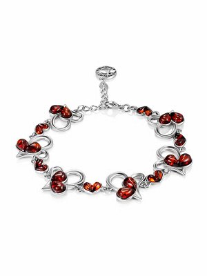 Ажурный «любовный» браслет с коньячным янтарём «Апрель»