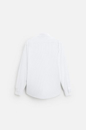 Рубашка ЦВЕТ как на первом фото РУБАШКА ИЗ СТРЕЙЧ-ТЕКСТУРЫ (ELASTISCHES HEMD MIT TEXTUR) Приталенная рубашка из ткани, практически не требующей глажки. Воротник «Виндзор». Длинные рукава с застегивающ
