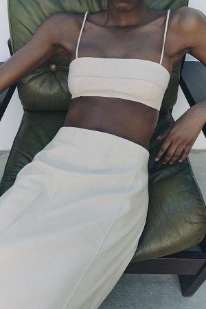 топ ЦВЕТ как на первом фото БАНДО ТОП ИЗ 100% КОЖИ (BANDEAU-TOP AUS 100 % LEDER) Верх бандо из 100% кожи. Узкие лямки. Застежка на металлический крючок сзади. СОСТАВ МАТЕРИАЛА, ИНСТРУКЦИИ ПО УХОДУ И П