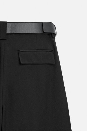 Брюки ЦВЕТ как на первом фото БРЮКИ С ПЛИССИРОВКОЙ И ПОЯСОМ (HOSE MIT BUNDFALTEN UND G?RTEL) Брюки прямого кроя. Пояс с отделкой из искусственной кожи и складками спереди. Передние карманы и задние ка