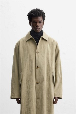Жакет ЦВЕТ как на первом фото ТРЕНЧ СВОБОДНОГО КРОЯ (TRENCHCOAT RELAXED FIT) Тренч свободного кроя из функциональной ткани. Воротник-лацкан и длинные рукава. Карманы с клапанами на бедрах и внутренний